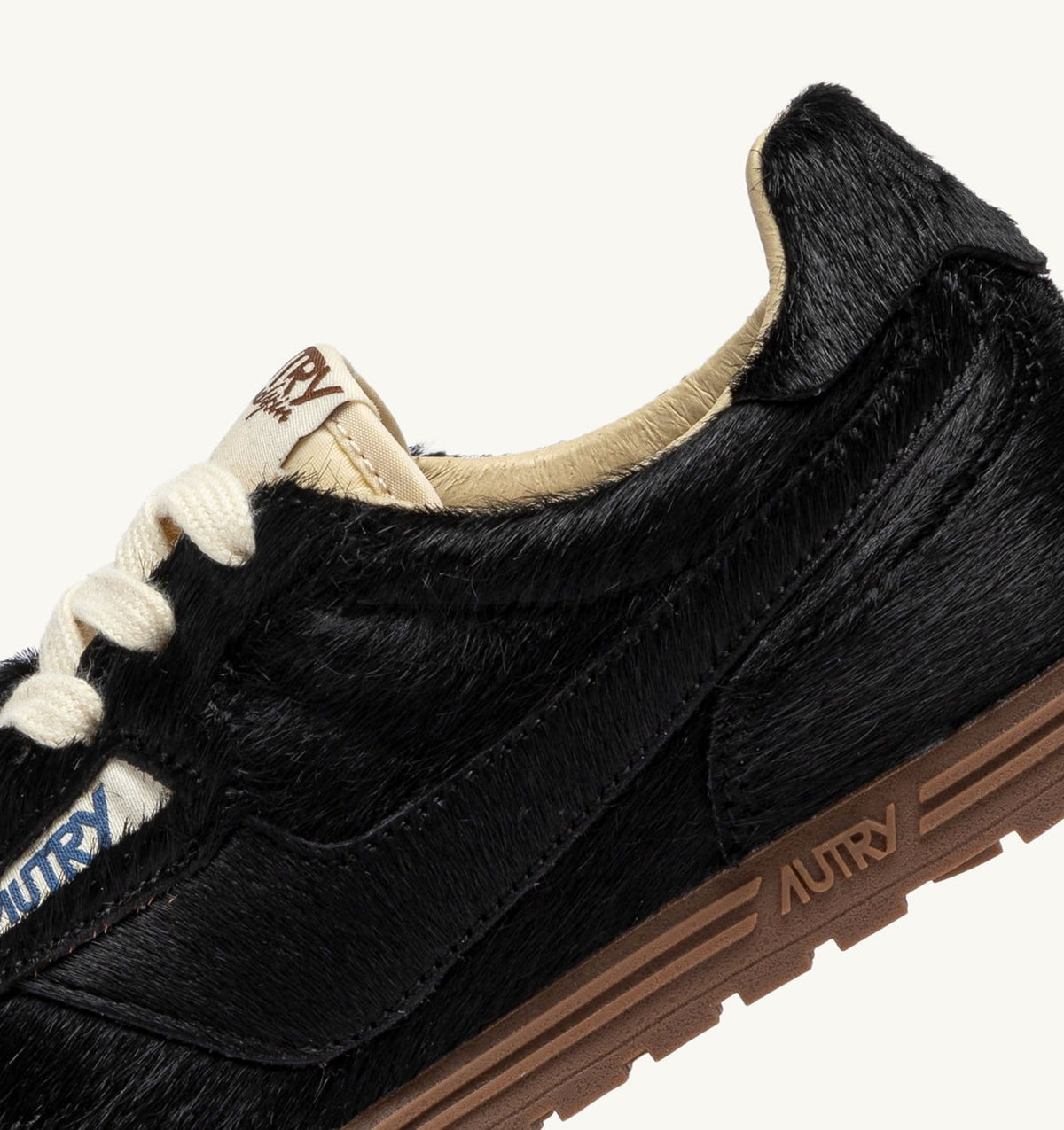 AUTRY Woman WINDSPIN SNEAKERS IN BLACK PONY HAIR EFFECT