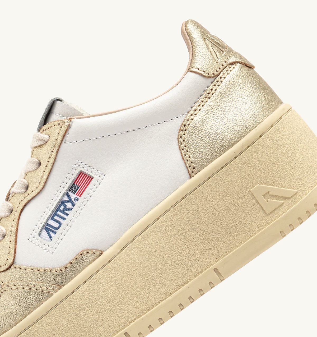 AUTRY Woman MEDALIST PLATFORM SNEAKERS IN WHITE AND METALIZED PLATINUM LEATHER