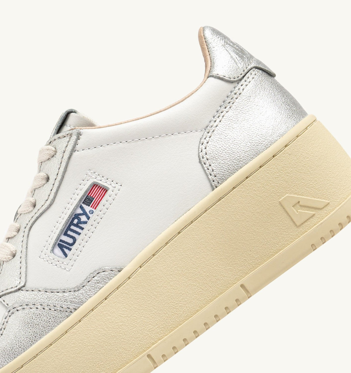 AUTRY Woman MEDALIST PLATFORM SNEAKERS IN WHITE AND METALIZED SILVER LEATHER