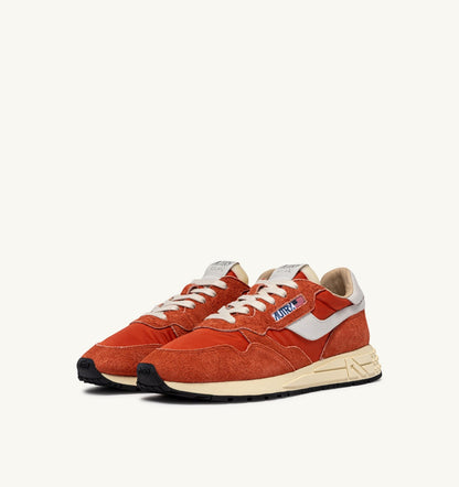 AUTRY Woman REELWIND LOW SNEAKERS IN WHITE AND ORANGE RUST NYLON AND SUEDE