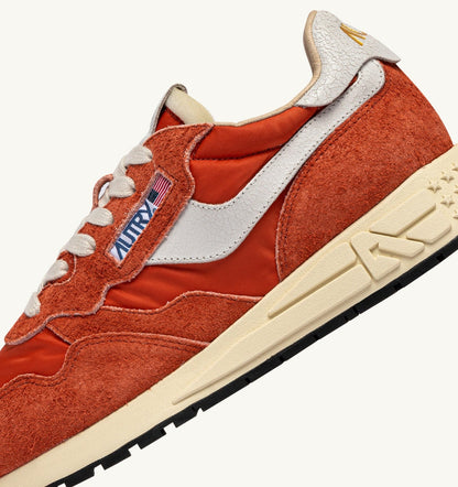 AUTRY Woman REELWIND LOW SNEAKERS IN WHITE AND ORANGE RUST NYLON AND SUEDE