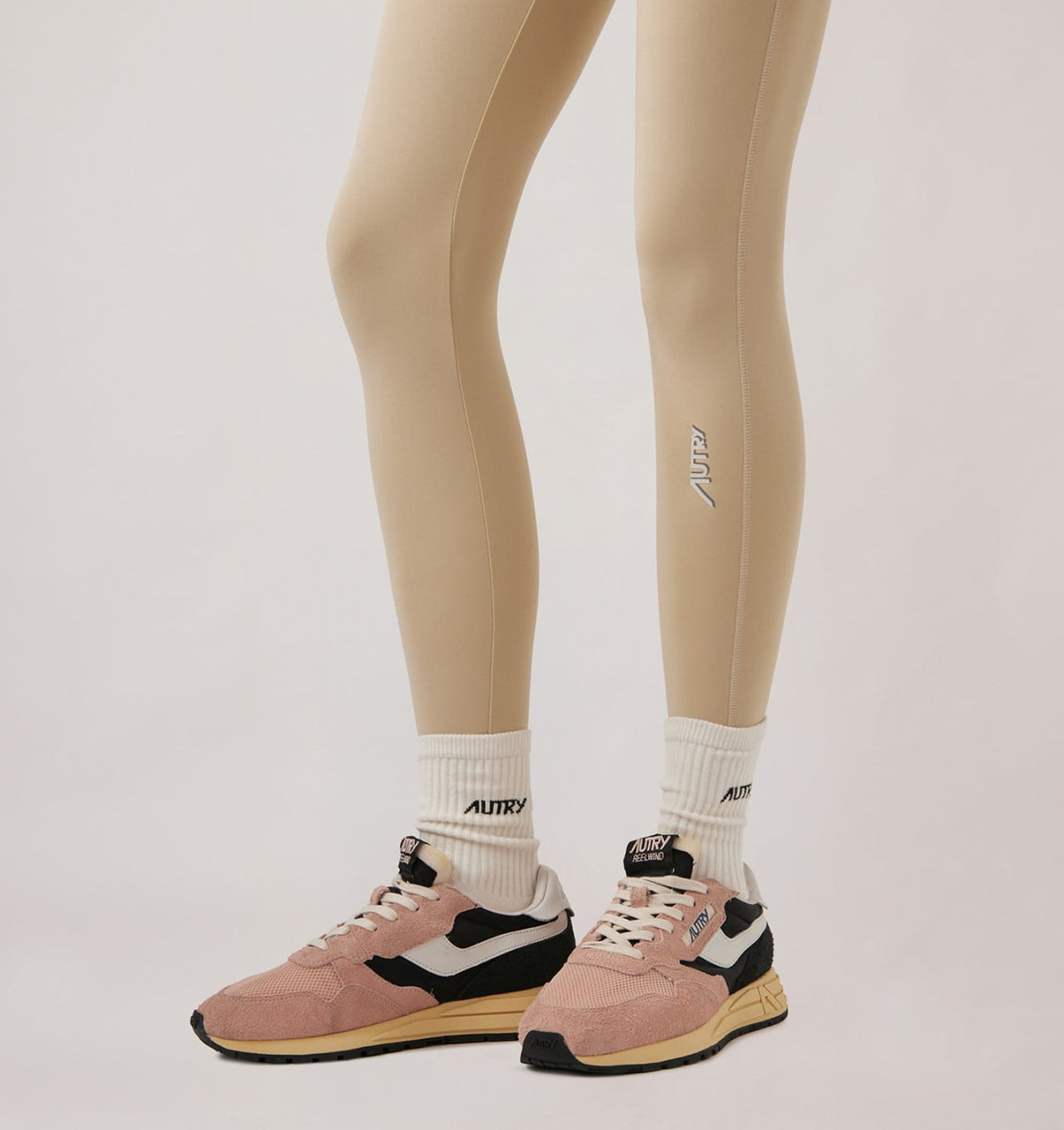 AUTRY Woman REELWIND LOW SNEAKERS IN BLACK AND ROSA NYLON AND SUEDE