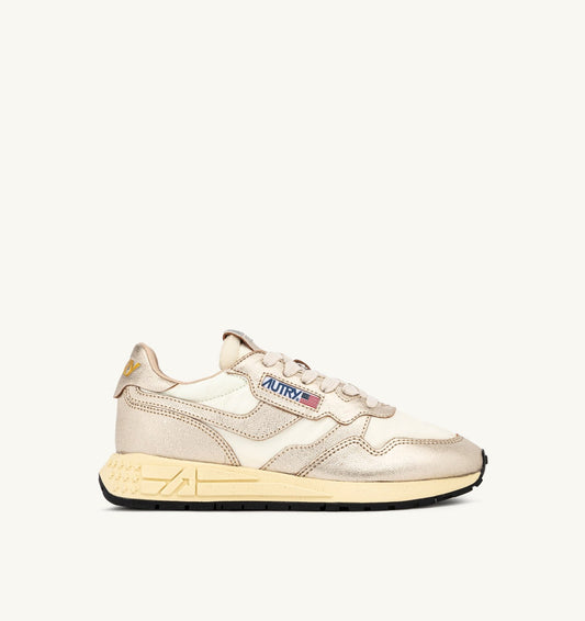AUTRY Woman REELWIND SNEAKERS IN GOLD- TONE NYLON AND METALIZED LEATHER