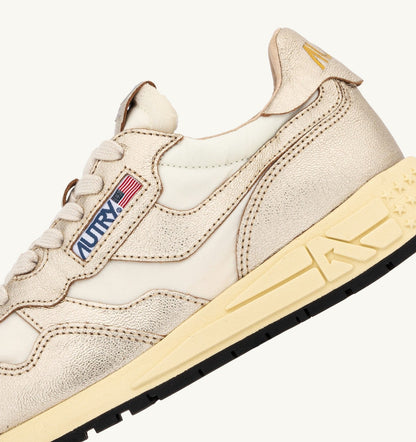 AUTRY Woman REELWIND SNEAKERS IN GOLD- TONE NYLON AND METALIZED LEATHER