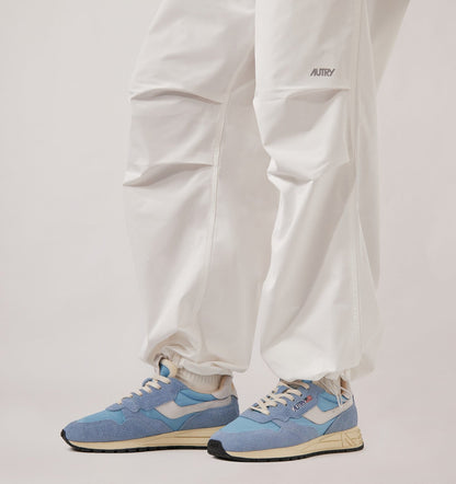 AUTRY Woman REELWIND LOW SNEAKERS IN WHITE AND FORGET ME NOT NYLON AND SUEDE