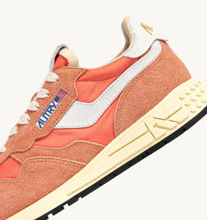 AUTRY Woman REELWIND LOW SNEAKERS IN WHITE AND PEACH PINK NYLON AND SUEDE