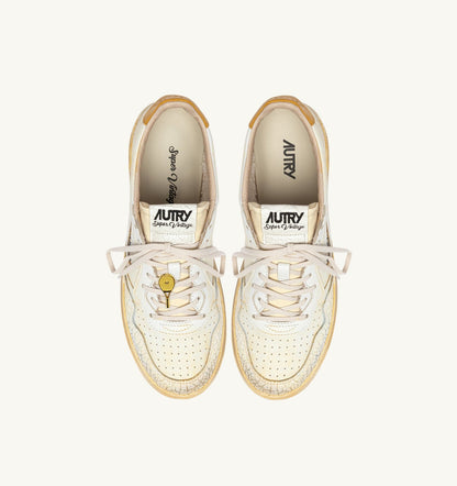 AUTRY Man MEDALIST LOW SUPER VINTAGE SNEAKERS IN WHITE AND YELLOW LEATHER