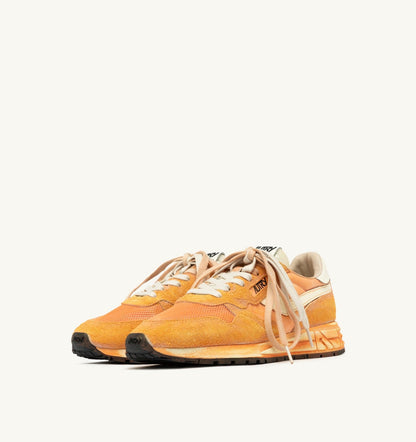 AUTRY Man REELWIND SUPER VINTAGE SNEAKERS IN WHITE AND ORANGE SUEDE AND NYLON