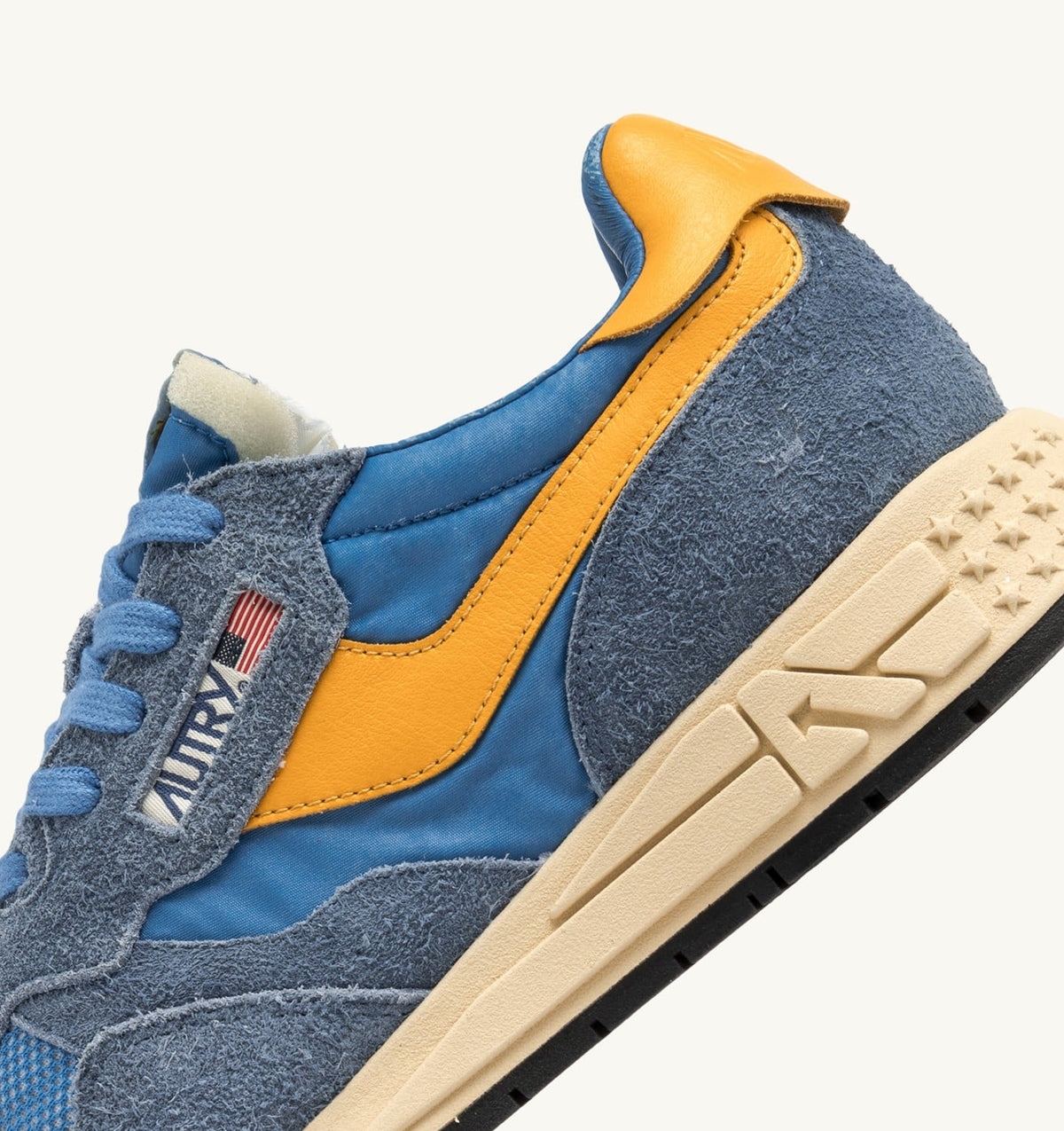 AUTRY Man REELWIND LOW SNEAKERS IN CENBLE AND GOLD FUSION NYLON AND SUEDE