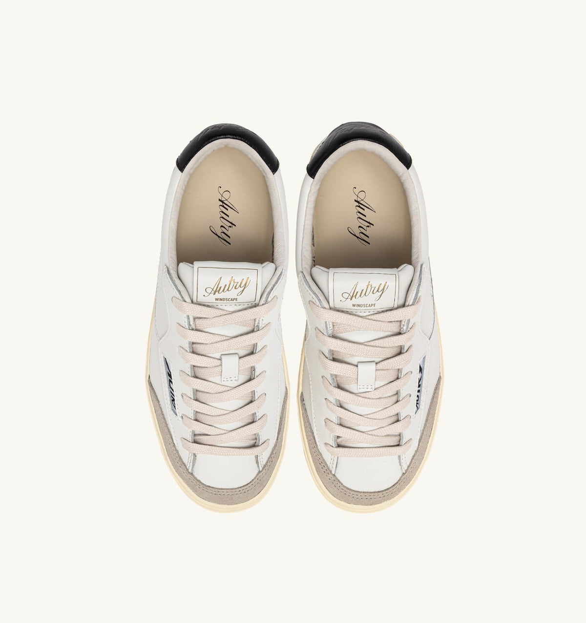 AUTRY Man WINDSCAPE LOW SNEAKERS IN WHITE AND BLACK LEATHER