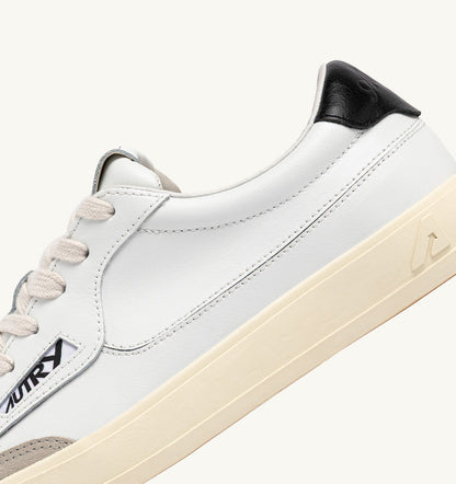 AUTRY Man WINDSCAPE LOW SNEAKERS IN WHITE AND BLACK LEATHER