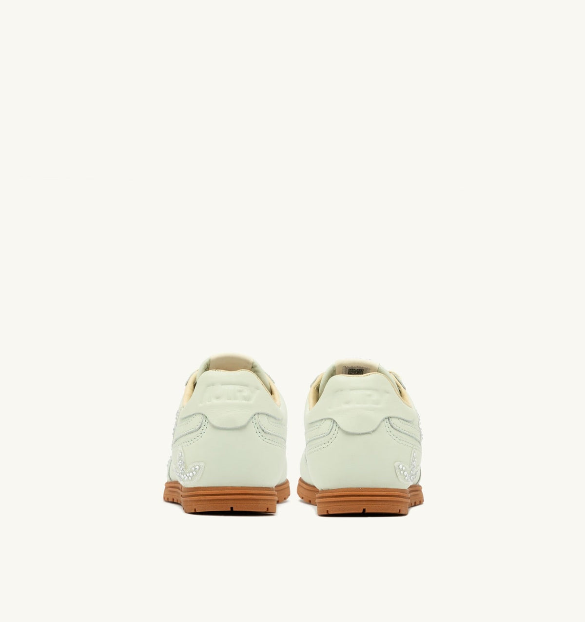 AUTRY Woman WINDSPIN SNEAKERS IN BONE WHITE LEATHER WITH DECORATIONS