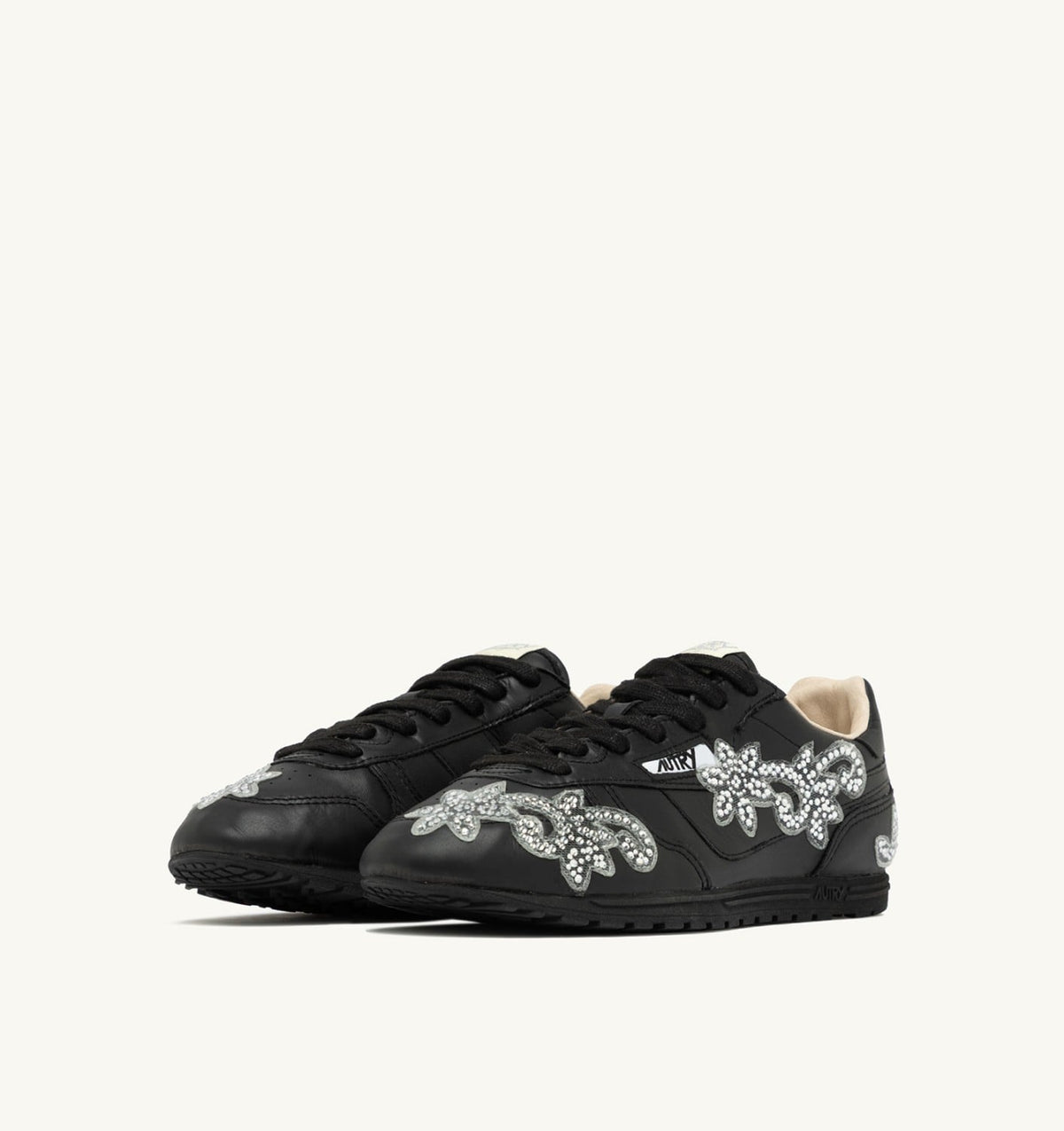 AUTRY Woman WINDSPIN SNEAKERS IN BLACK LEATHER WITH DECORATIONS