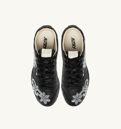 AUTRY Woman WINDSPIN SNEAKERS IN BLACK LEATHER WITH DECORATIONS
