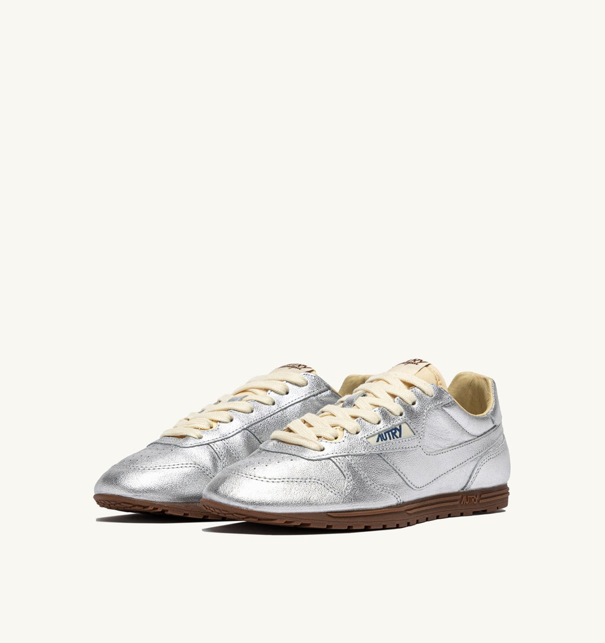 AUTRY Woman WINDSPIN SNEAKERS IN SILVER TONE LAMINATED LEATHER