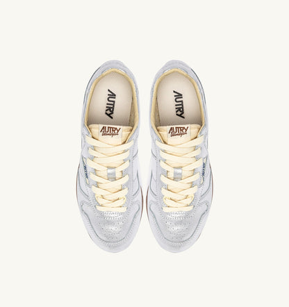 AUTRY Woman WINDSPIN SNEAKERS IN SILVER TONE LAMINATED LEATHER