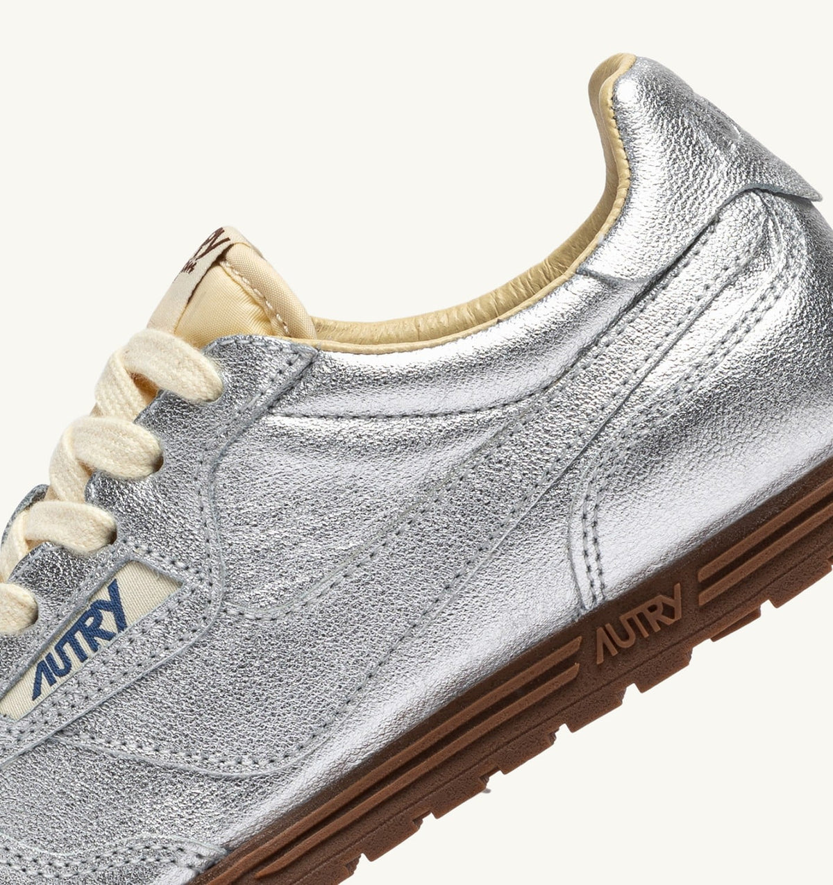 AUTRY Woman WINDSPIN SNEAKERS IN SILVER TONE LAMINATED LEATHER