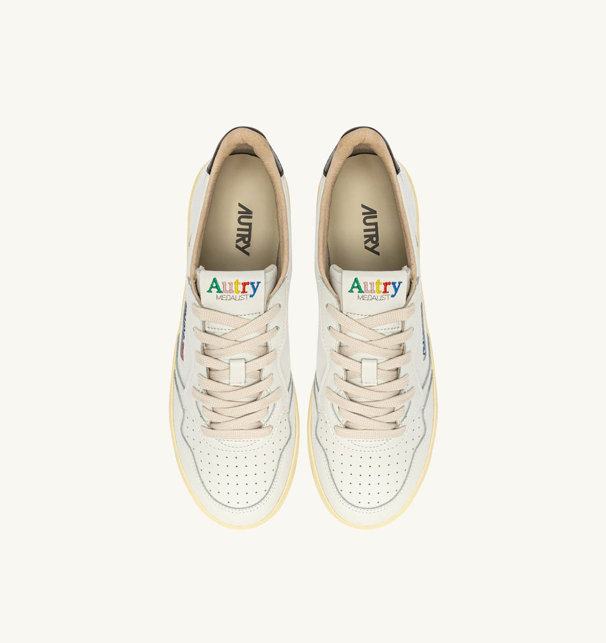 AUTRY Man MEDALIST LOW SNEAKERS IN WHITE AND BLACK LEATHER