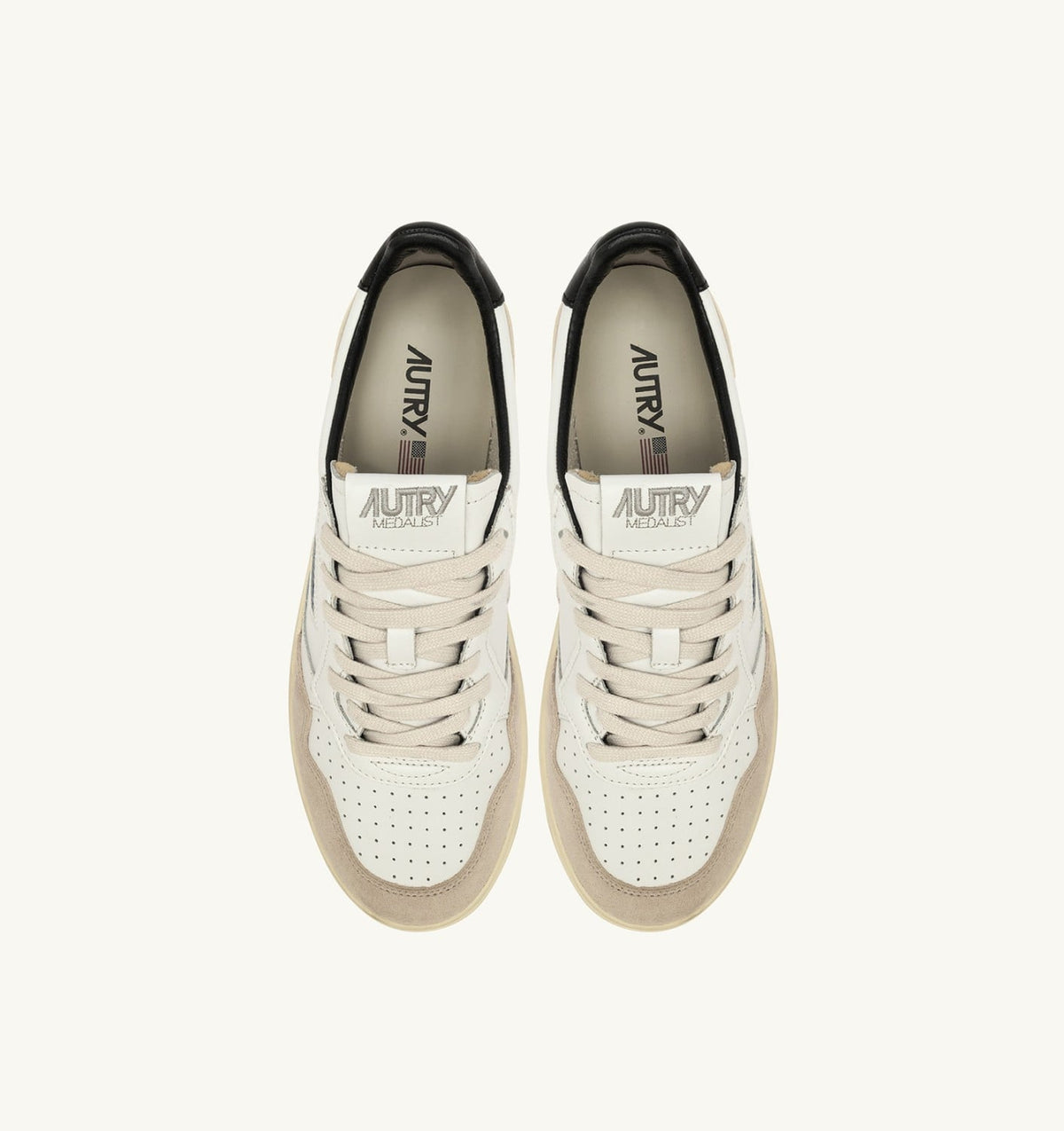 AUTRY Man MEDALIST LOW SNEAKERS IN WHITE AND BLACK SUEDE AND LEATHER WITH LETTERING