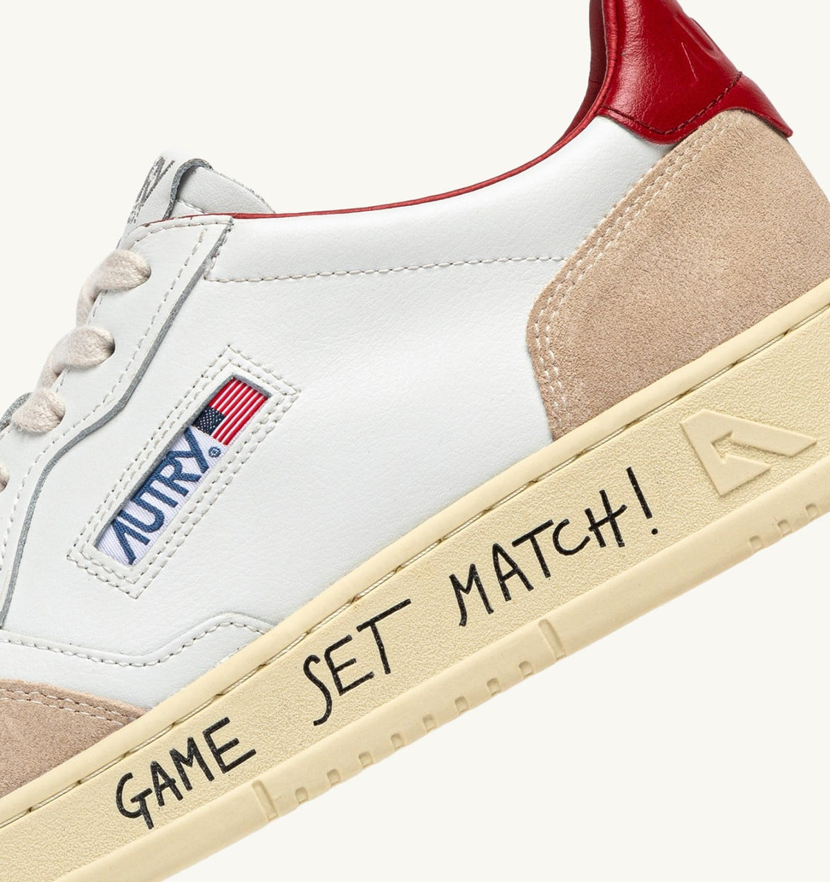 AUTRY Man MEDALIST LOW SNEAKERS IN WHITE AND RED SUEDE AND LEATHER WITH LETTERING