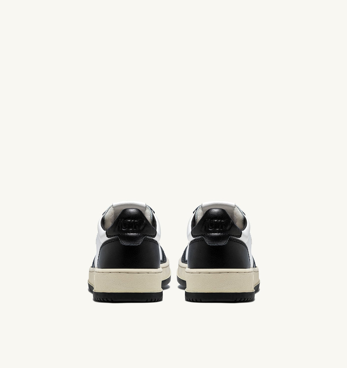 AUTRY Man MEDALIST LOW BICOLOR SNEAKERS IN WHITE AND BLACK LEATHER