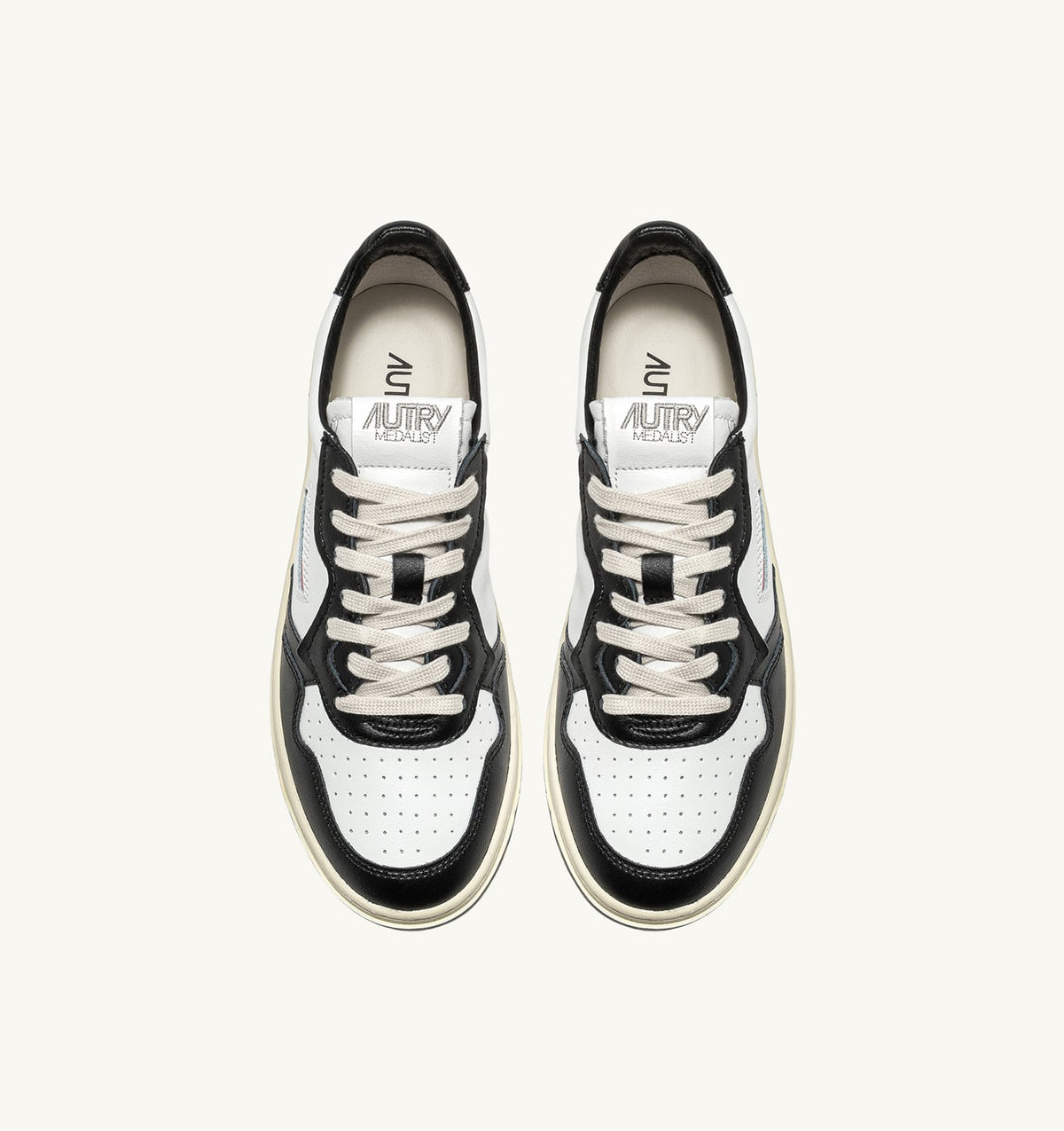 AUTRY Man MEDALIST LOW BICOLOR SNEAKERS IN WHITE AND BLACK LEATHER