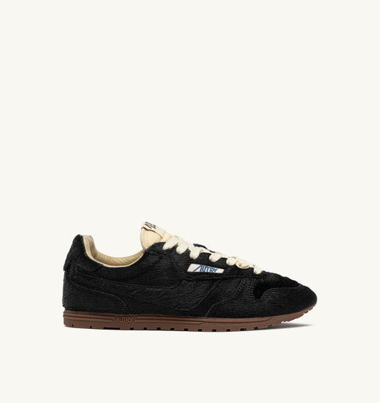 AUTRY Woman WINDSPIN SNEAKERS IN BLACK PONY HAIR EFFECT