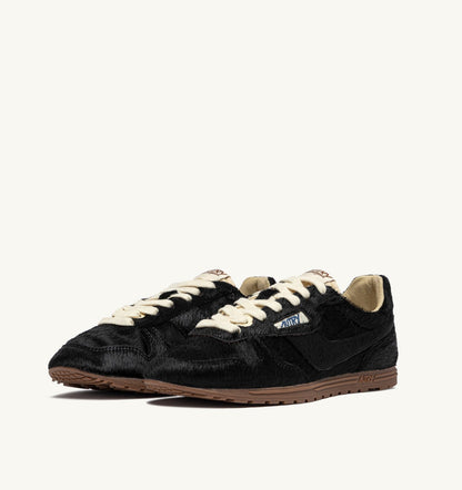 AUTRY Woman WINDSPIN SNEAKERS IN BLACK PONY HAIR EFFECT