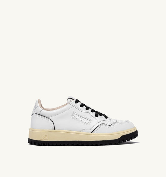 AUTRY Woman GOLF LOW SNEAKERS IN WHITE AND BLACK LEATHER