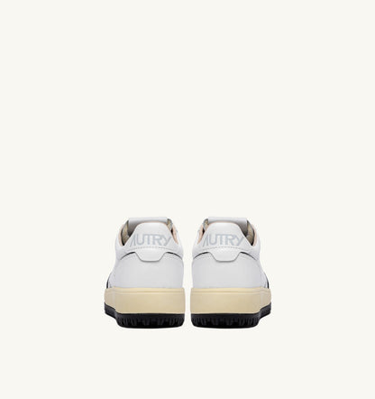AUTRY Woman GOLF LOW SNEAKERS IN WHITE AND BLACK LEATHER