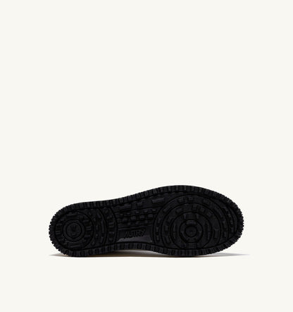 AUTRY Woman GOLF LOW SNEAKERS IN WHITE AND BLACK LEATHER
