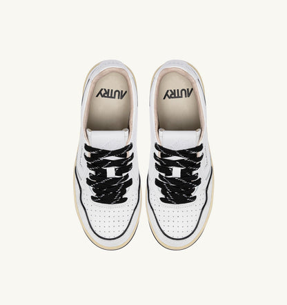 AUTRY Woman GOLF LOW SNEAKERS IN WHITE AND BLACK LEATHER