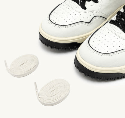 AUTRY Woman GOLF LOW SNEAKERS IN WHITE AND BLACK LEATHER