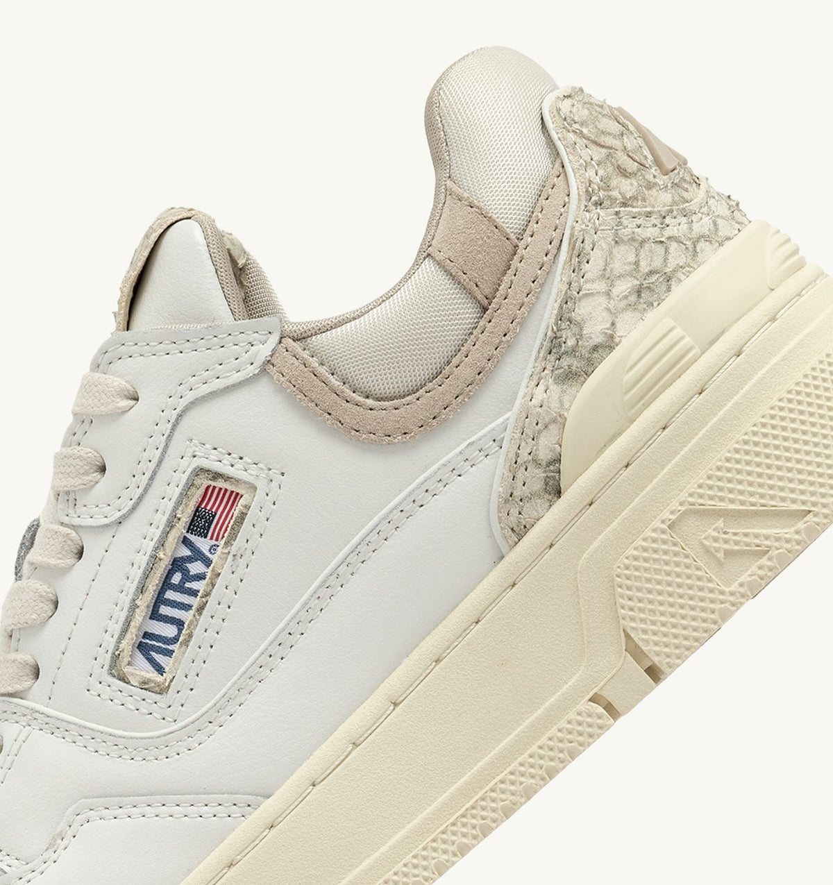AUTRY Woman CLC LOW SNEAKERS IN WHITE LEATHER WITH SNAKE DIAMOND PRINT