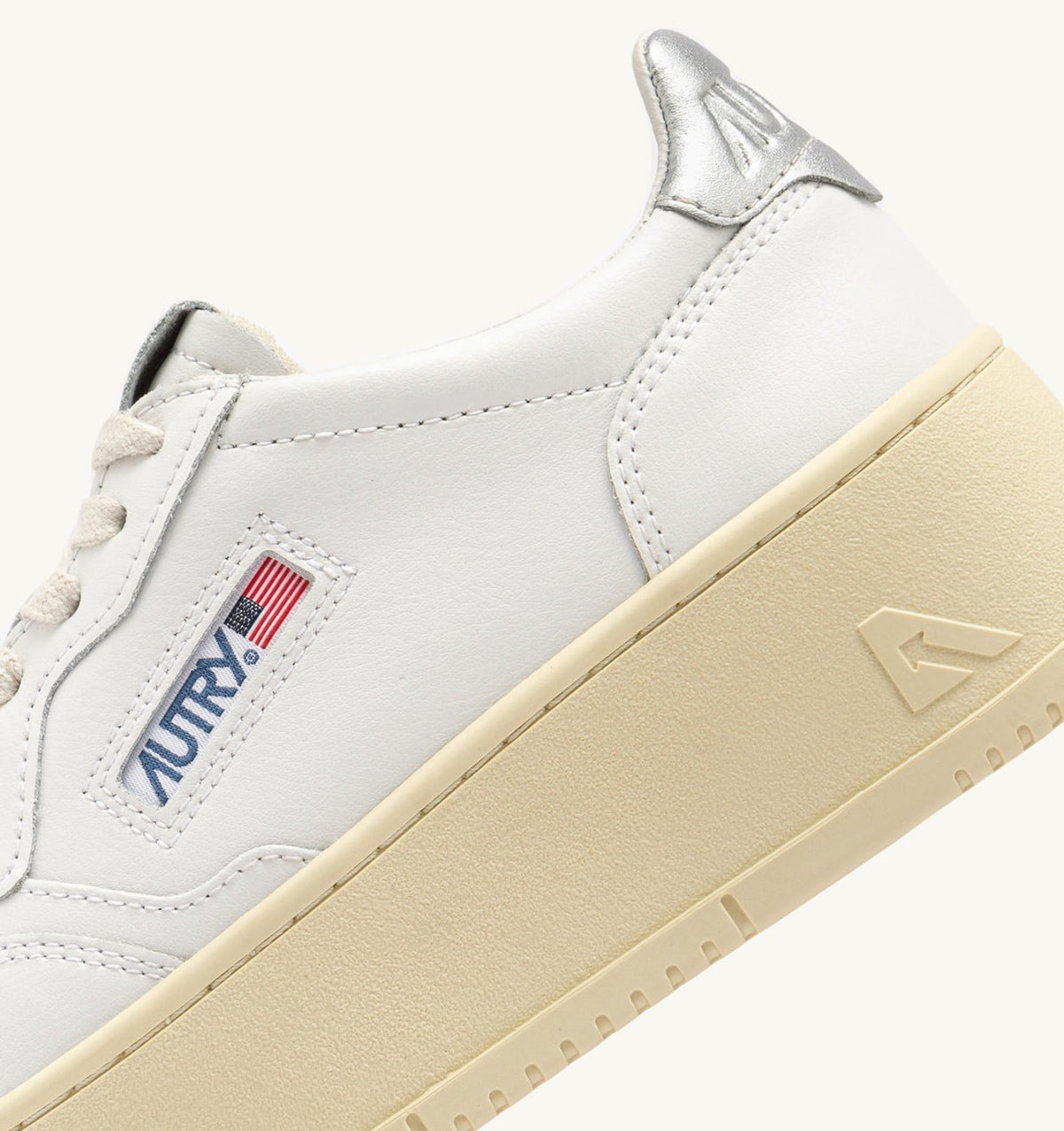 AUTRY Woman MEDALIST PLATFORM SNEAKERS IN WHITE AND METALIZED SILVER LEATHER
