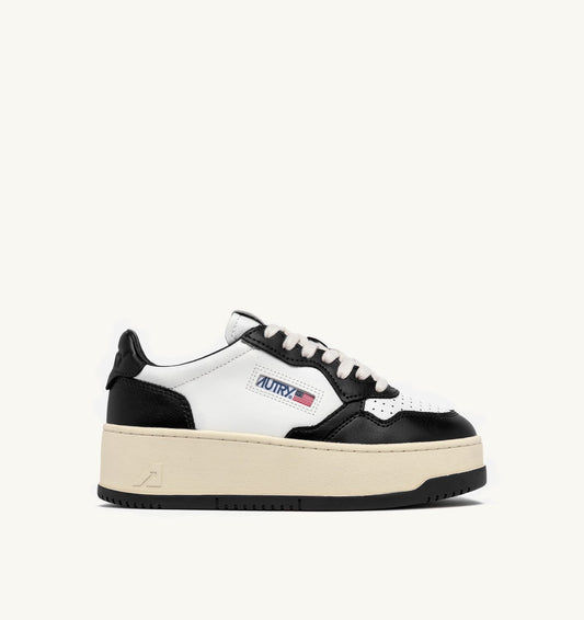 AUTRY Woman MEDALIST PLATFORM SNEAKERS IN WHITE AND BLACK LEATHER