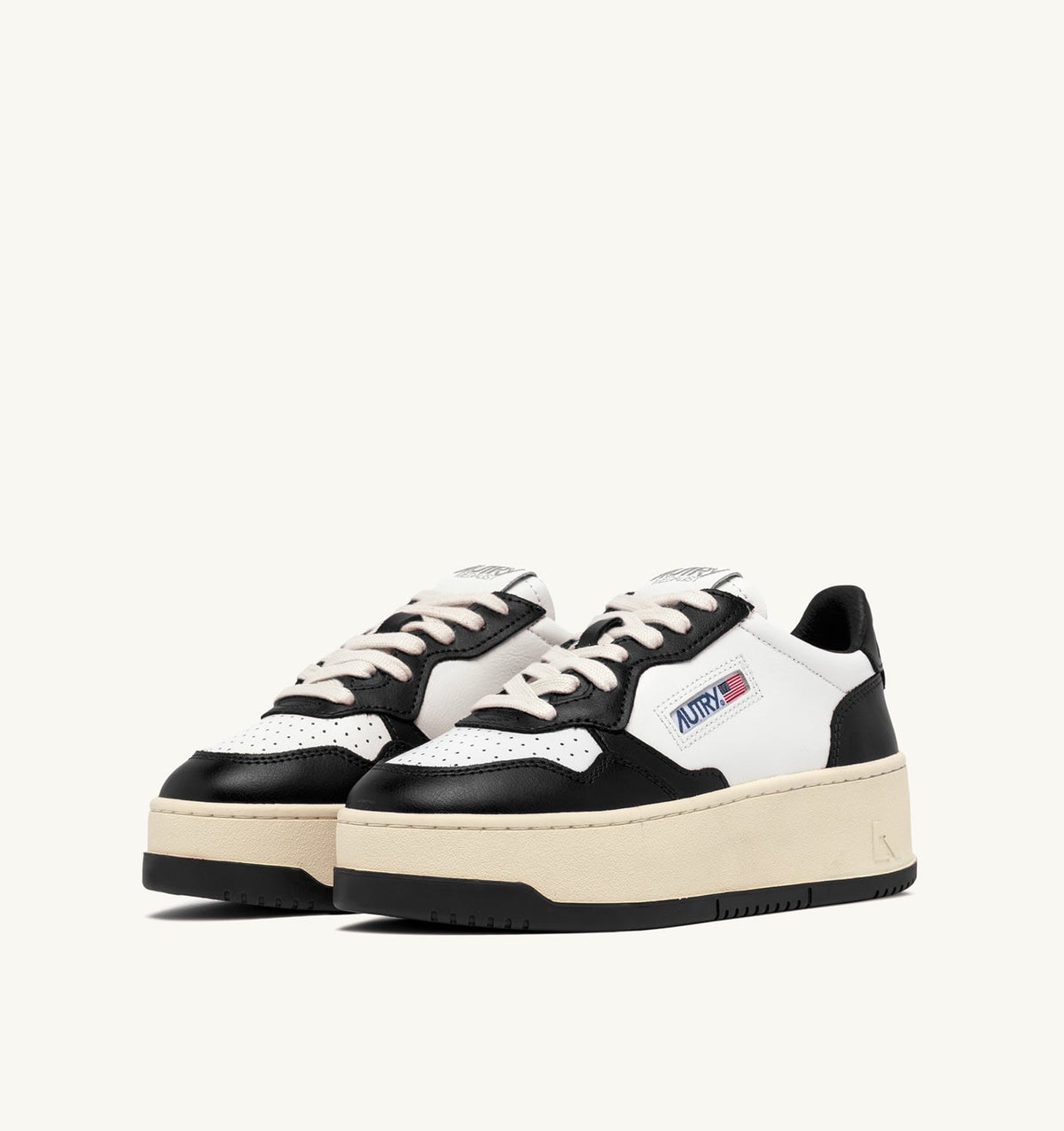 AUTRY Woman MEDALIST PLATFORM SNEAKERS IN WHITE AND BLACK LEATHER