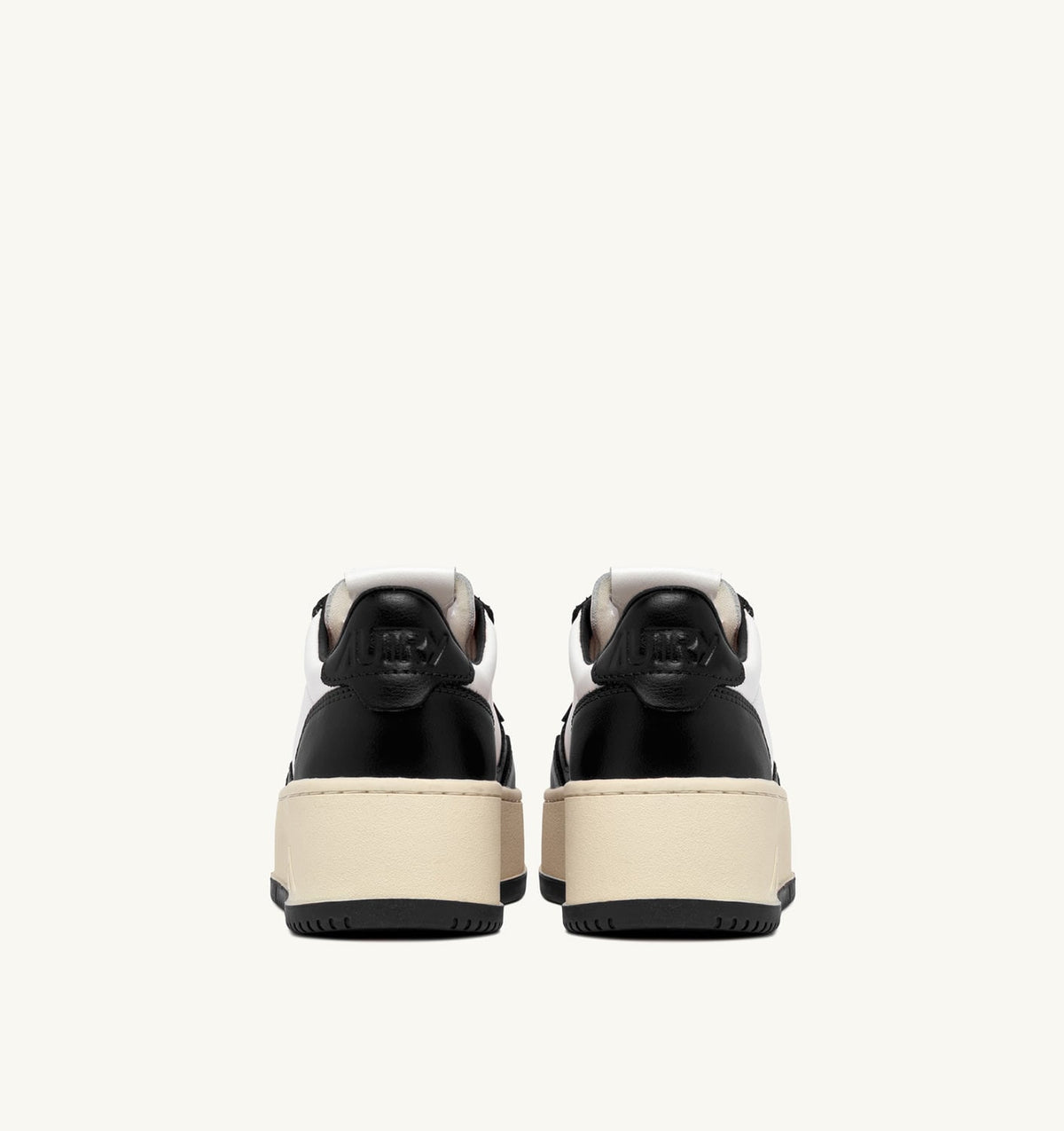 AUTRY Woman MEDALIST PLATFORM SNEAKERS IN WHITE AND BLACK LEATHER