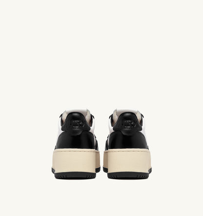 AUTRY Woman MEDALIST PLATFORM SNEAKERS IN WHITE AND BLACK LEATHER