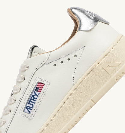 AUTRY Woman DALLAS LOW SNEAKERS IN WHITE AND SILVER LEATHER