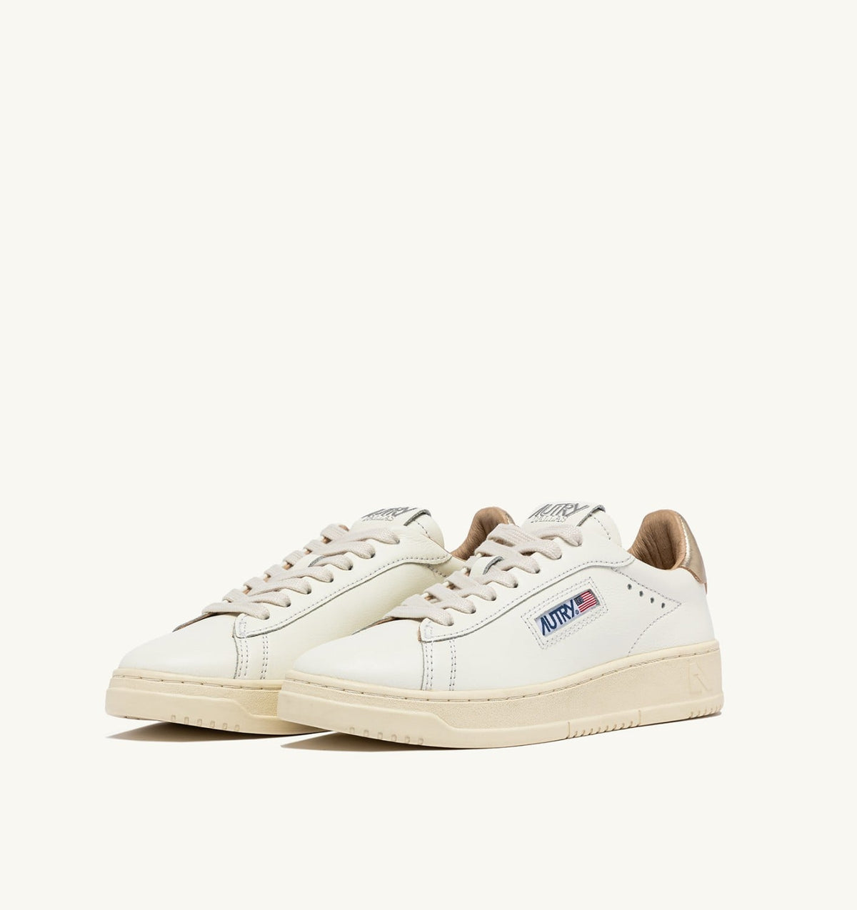 AUTRY Woman DALLAS LOW SNEAKERS IN WHITE AND GOLD LEATHER