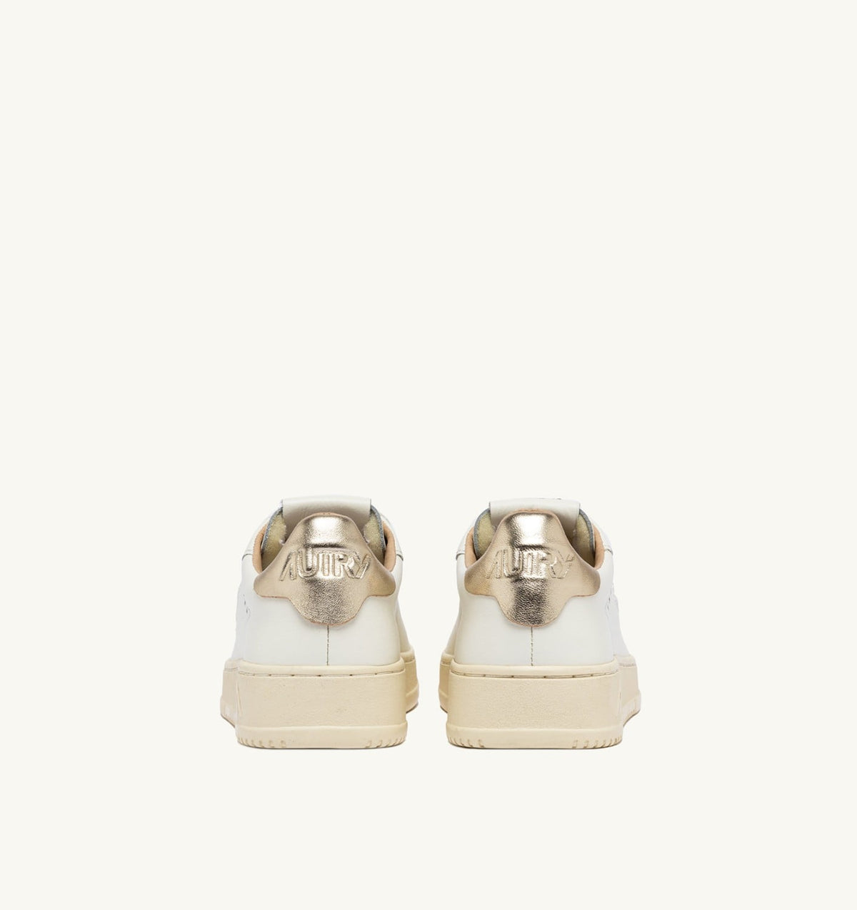 AUTRY Woman DALLAS LOW SNEAKERS IN WHITE AND GOLD LEATHER